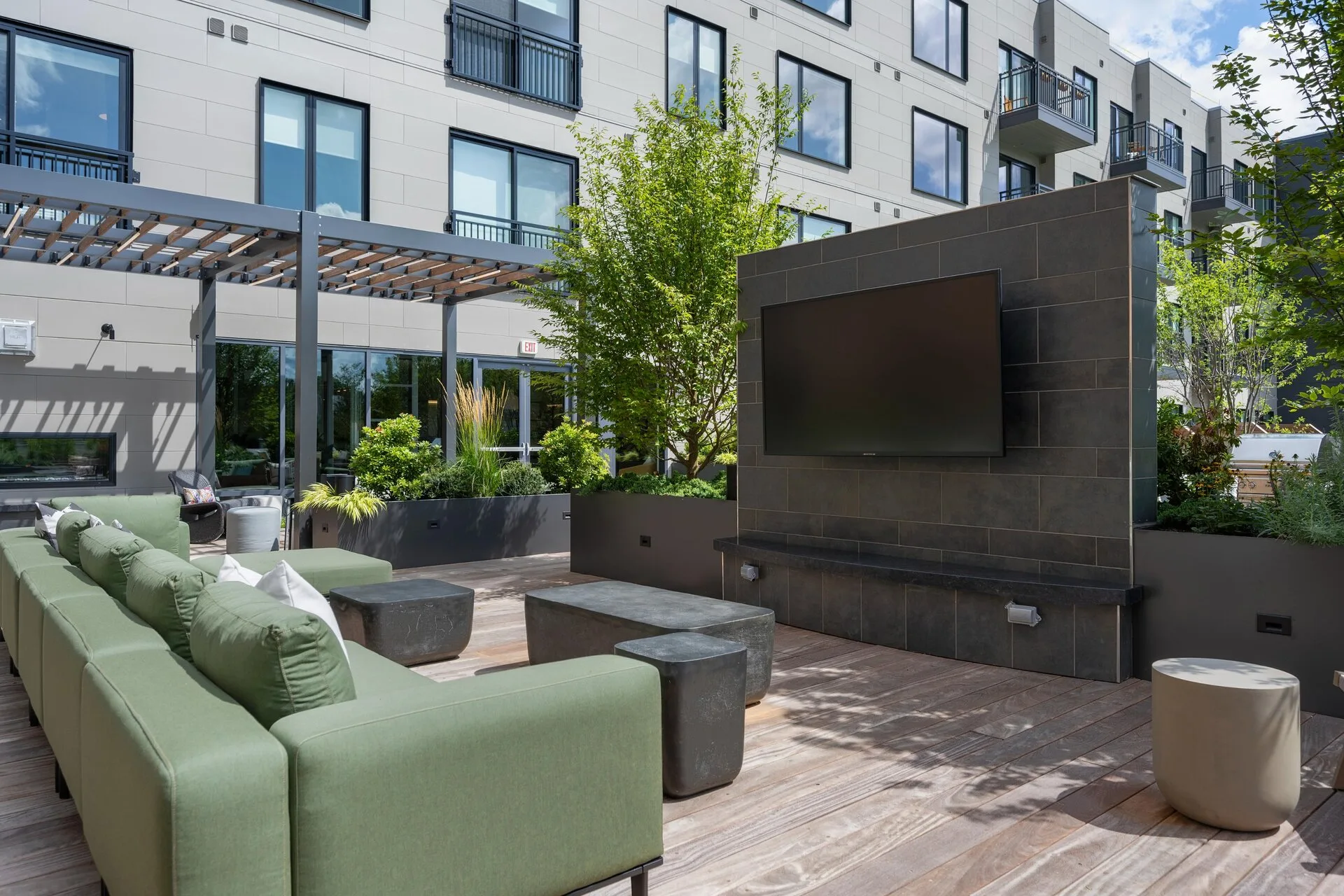 A wide-angle view of our rooftop deck showcasing the full range of amenities and breathtaking city views.