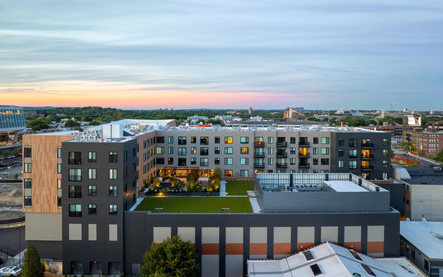 A breathtaking view of Alder’s outdoor courtyard, seamlessly blending nature with modern architecture.